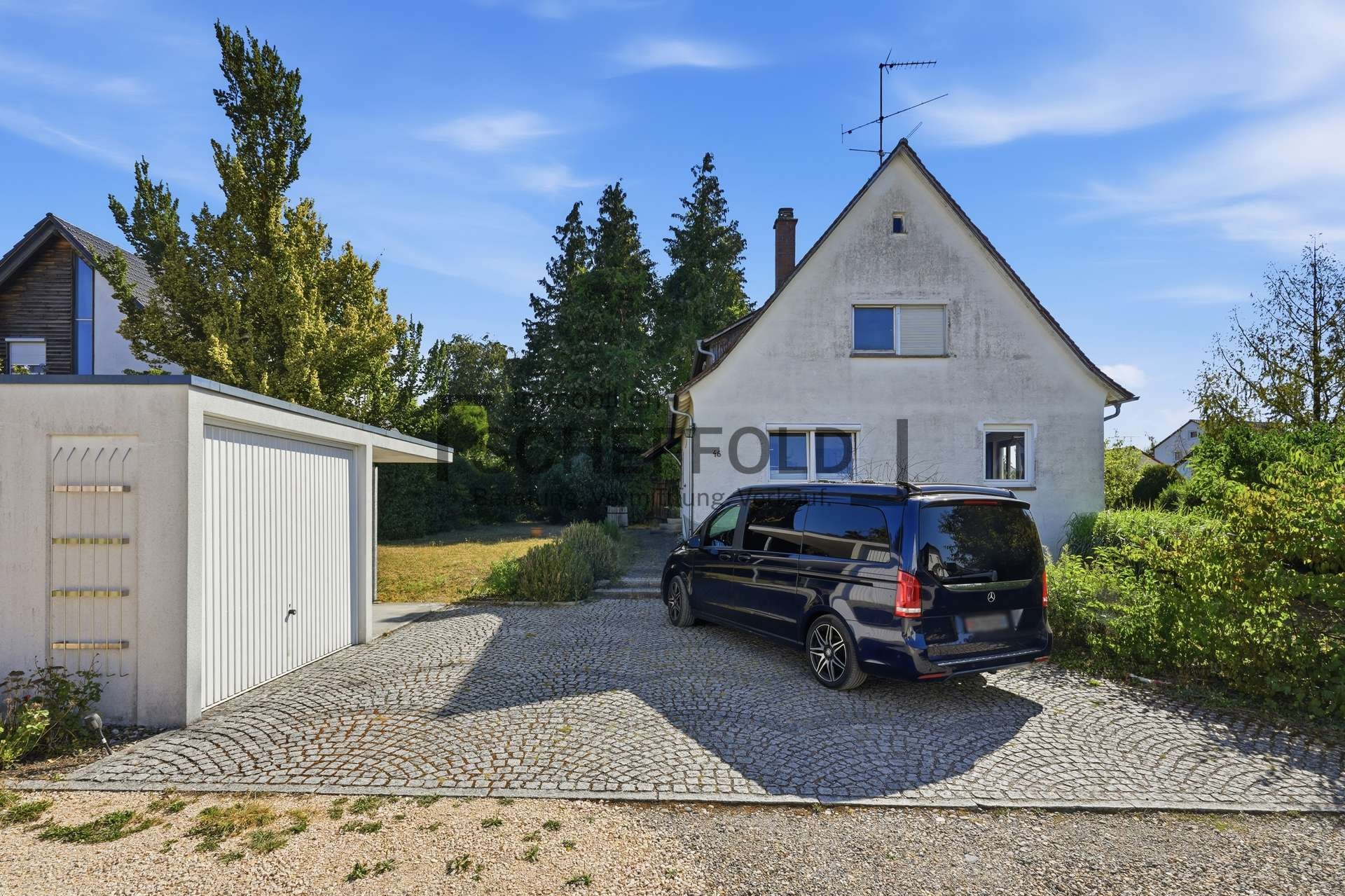 Potenzial! Zweifamilienhaus mit Garten sowie Baugrundstück und vielseitigen Nutzungsmöglichkeiten